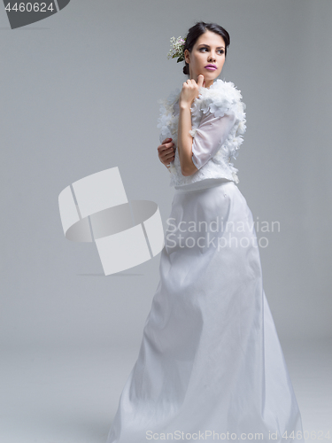 Image of Portrait of beautiful young women in wedding dress