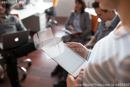 Image of Businesswoman using tablet