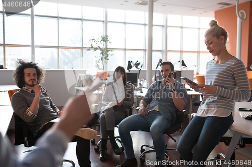 Image of Young Business Team At A Meeting at modern office building