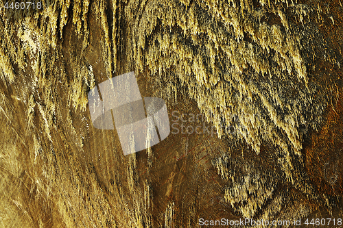 Image of stalactites on salt wall in mine