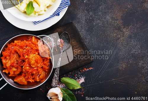 Image of fried cabbage and mashed potato