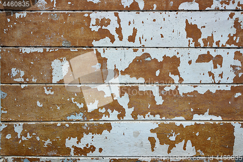 Image of damaged plaster on old wall