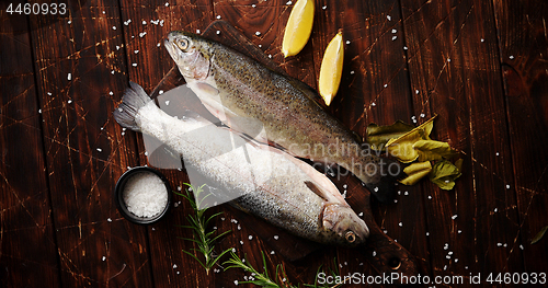 Image of Fresh trout with lemon on board