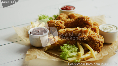 Image of Fresh sauces near fried chicken wings