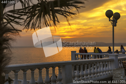 Image of Resort embankment on sea at sunset