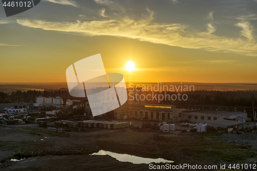 Image of Old demolished industrial factory at sunset