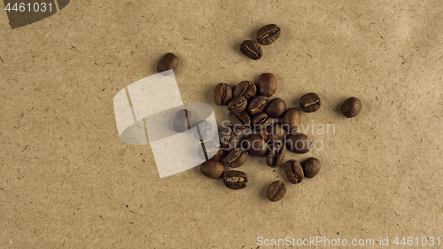 Image of Beans of natural coffee on coarse paper