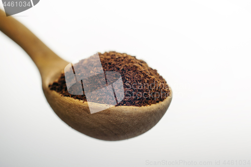 Image of Instant coffee in a wooden spoon