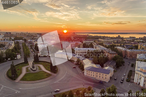 Image of Aerial panorama of city center at sunset time