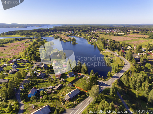 Image of Aerial view of beautiful lake and village around it