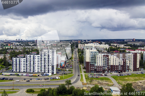 Image of High-rise buildings in city, aerial view of cityscape