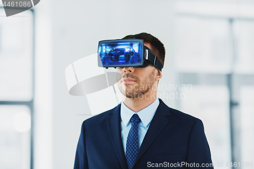 Image of businessman with virtual reality headset at office