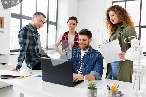 Image of creative team working on user interface at office