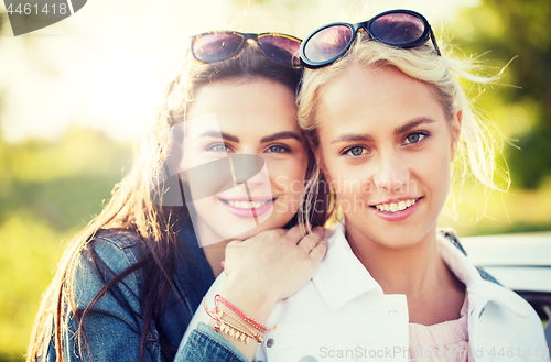 Image of happy young women or teenage girls outdoors