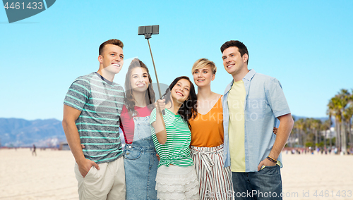 Image of friends taking selfie over venice beach