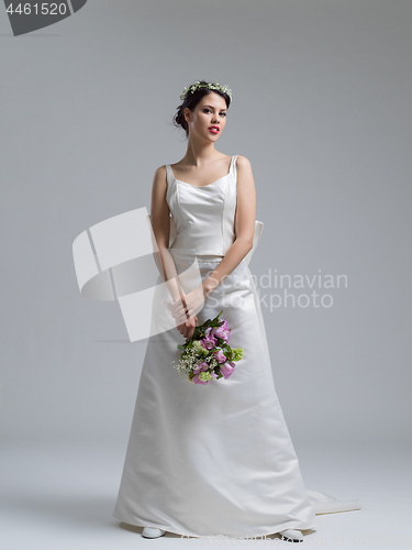 Image of bride with a bouquet  isolated on white background