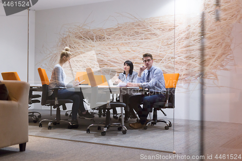 Image of Business Team At A Meeting at modern office building