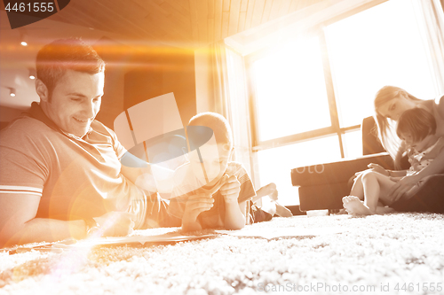 Image of young couple spending time with kids