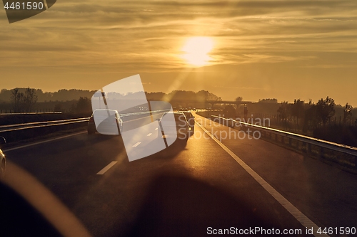 Image of Driving in sunset