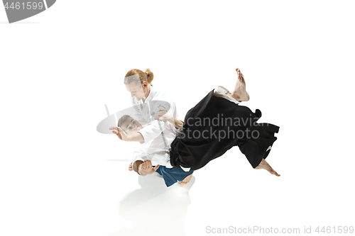 Image of The two men fighting at Aikido training in martial arts school