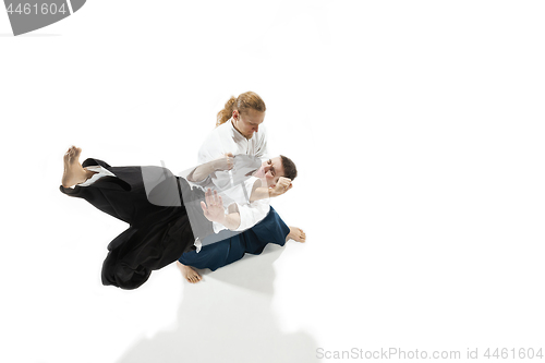 Image of The two men fighting at Aikido training in martial arts school