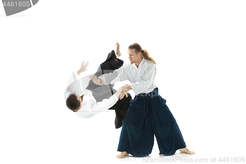 Image of The two men fighting at Aikido training in martial arts school