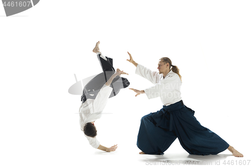 Image of The two men fighting at Aikido training in martial arts school