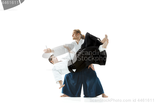 Image of The two men fighting at Aikido training in martial arts school