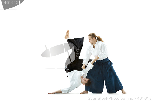 Image of The two men fighting at Aikido training in martial arts school