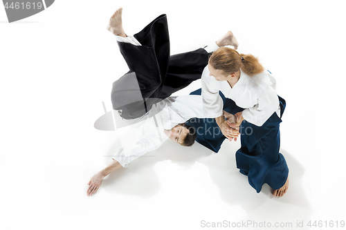 Image of The two men fighting at Aikido training in martial arts school