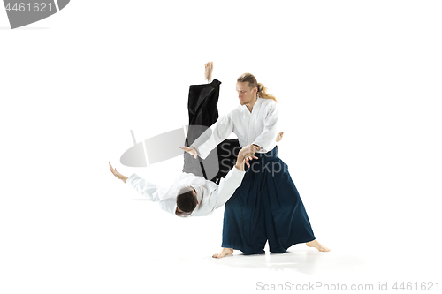 Image of The two men fighting at Aikido training in martial arts school