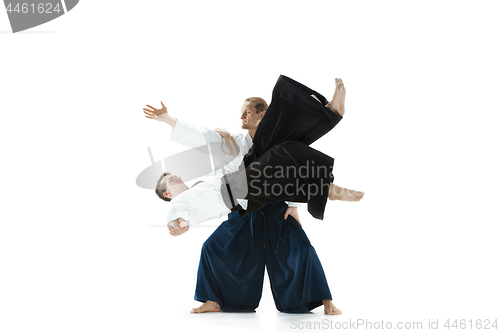 Image of The two men fighting at Aikido training in martial arts school