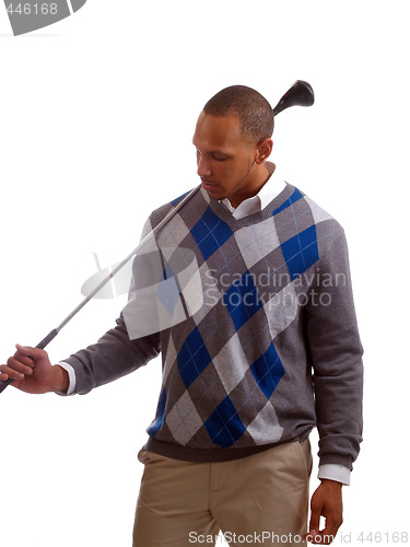 Image of Young black man in sweater with golf club