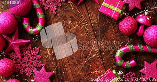 Image of Bright Christmas decorations on table