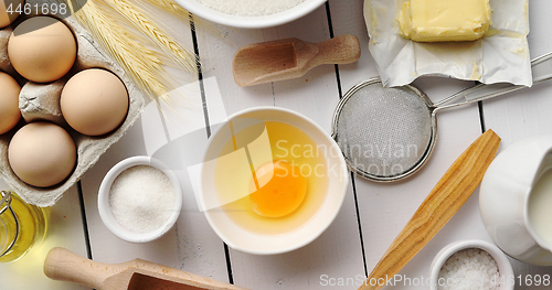 Image of Utensils and pastry ingredients on table