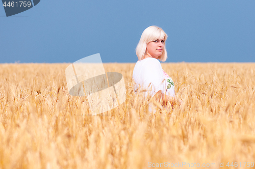 Image of Woman at wheat meadow