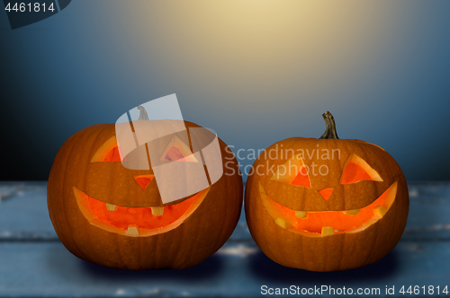 Image of close up of halloween pumpkins on table