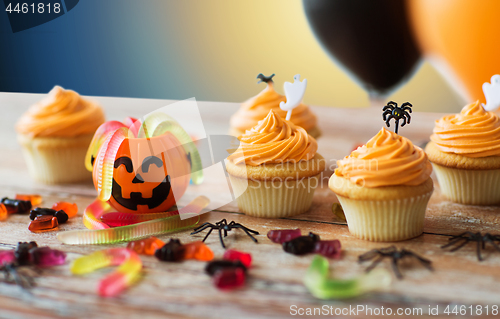 Image of halloween party cupcakes or muffins on table