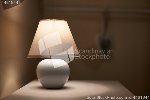 Image of Lamp on a nightstand