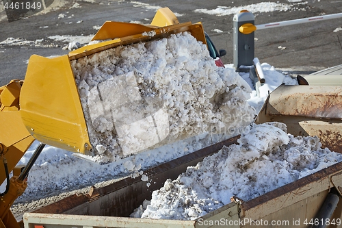 Image of Loader removing snow from street
