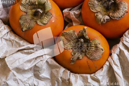 Image of Kaki fruits (persimmon) in a box 