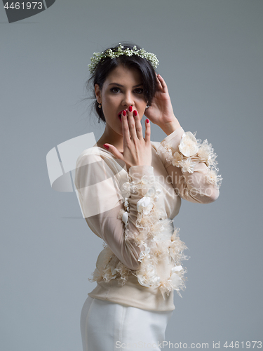 Image of Portrait of beautiful young women in wedding dress