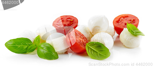 Image of Mozzarella cheese balls with tomato and basil