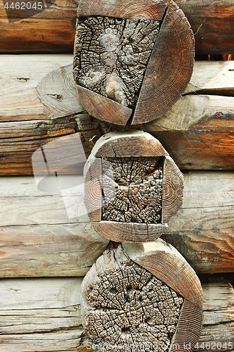 Image of repairs on old log house