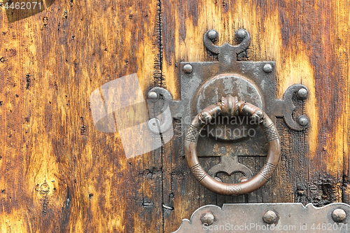 Image of detail of old wooden door