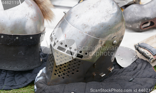 Image of Medieval warrior\'s steel helmet with a visor 