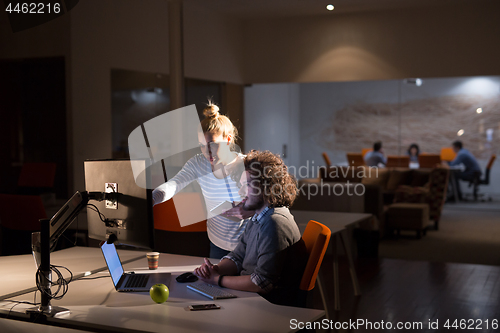 Image of young designers in the night office