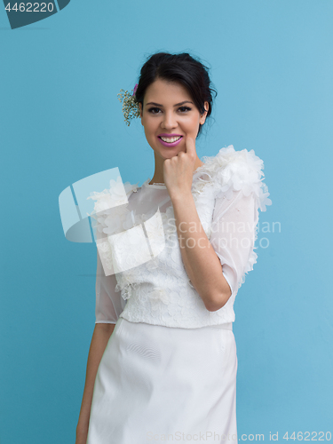 Image of beautiful young women in wedding dress