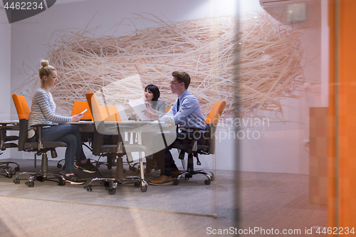 Image of Business Team At A Meeting at modern office building