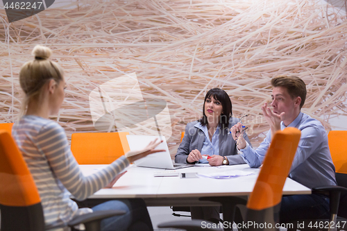 Image of Business Team At A Meeting at modern office building